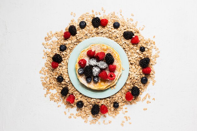 Breakfast plate with strawberries and wild berries