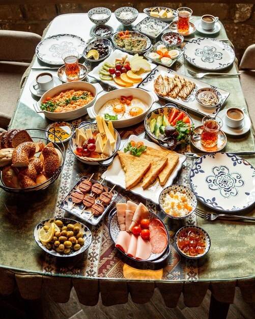 Breakfast set with various food on the table