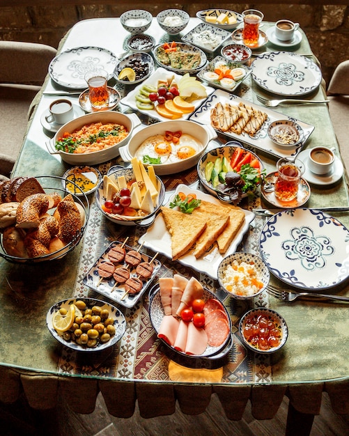 Breakfast set with various food on the table