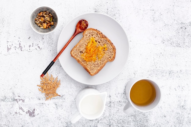 Breakfast with bread and cup of tea