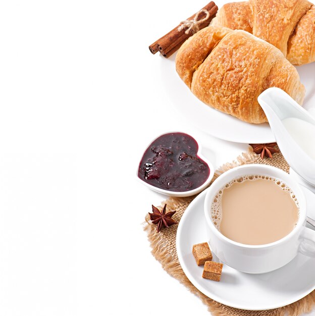 Breakfast with coffee and fresh croissants