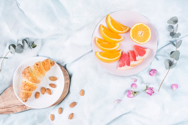 Breakfast with croissant and fruits