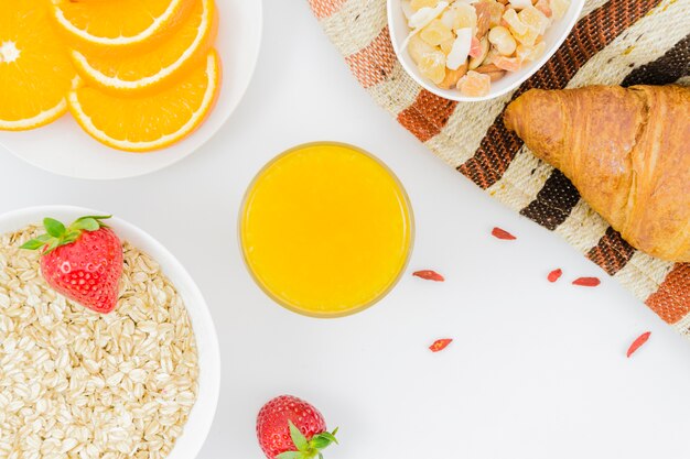 Breakfast with croissants and fruits