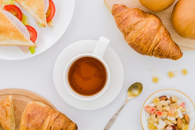 Breakfast with croissants and fruits