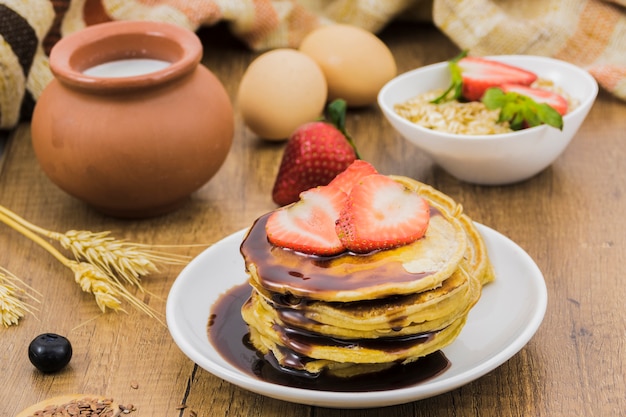 Breakfast with pancakes and strawberries