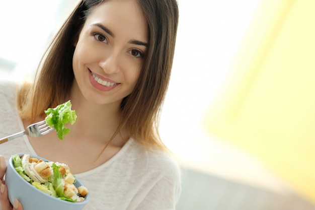 Free photo breakfast, woman eating