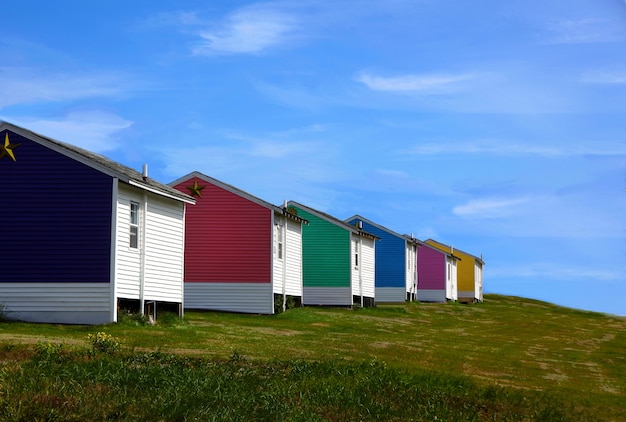 Breathtaking shot of colorful houses on a blue sky