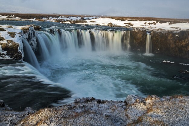 Breathtaking shot of waterfalls in a circular formation