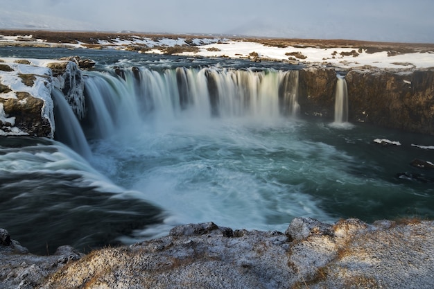 Breathtaking shot of waterfalls in a circular formation