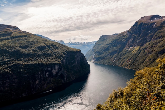 Breathtaking view of sunnylvsfjorden fjord and famous seven sisters waterfall; norway