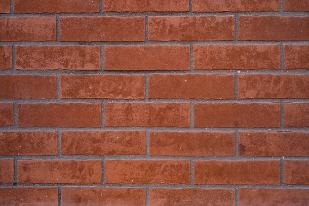 Brick wall. Texture of red brick with gray filling