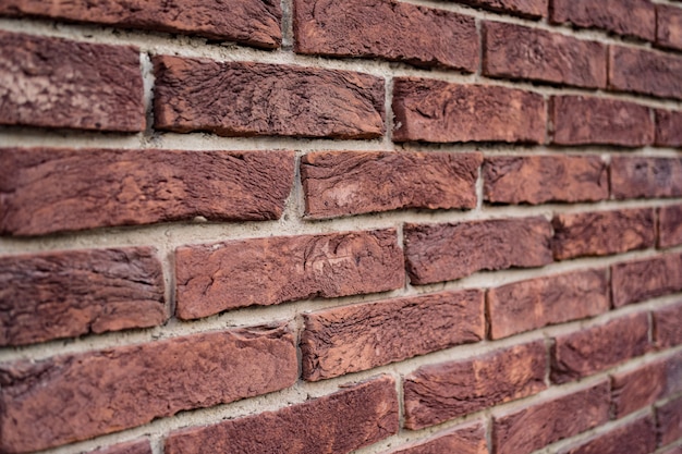 Brick wall. Texture of red brick with white filling