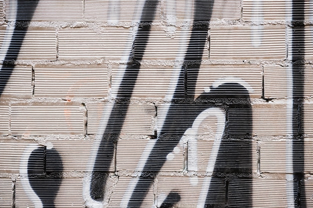 Brick wall texture with graffiti