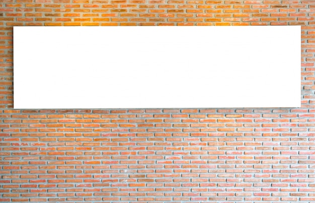 Foto gratuita muro di mattoni con il segno in bianco