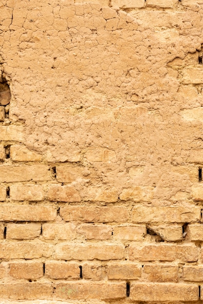 Free photo brick wall with concrete and aged surface