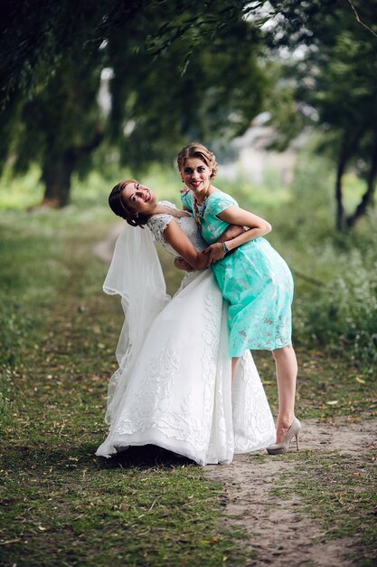 Bride dancing with bridesmaid