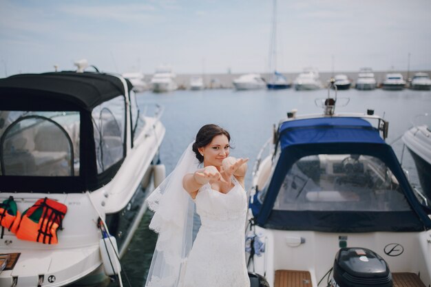 Bride extending arms