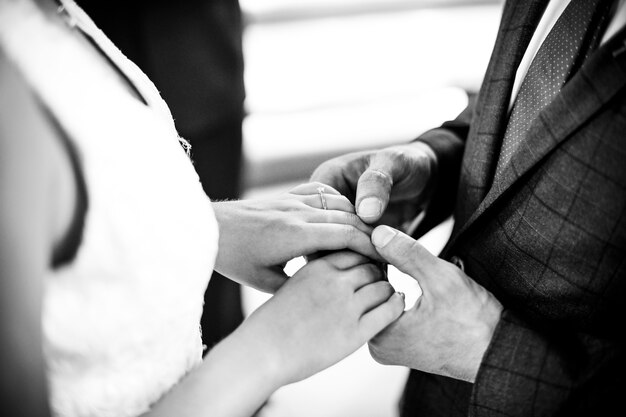 Bride and groom standing at the altar