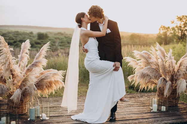 Free photo bride and groom on their wedding ceremony