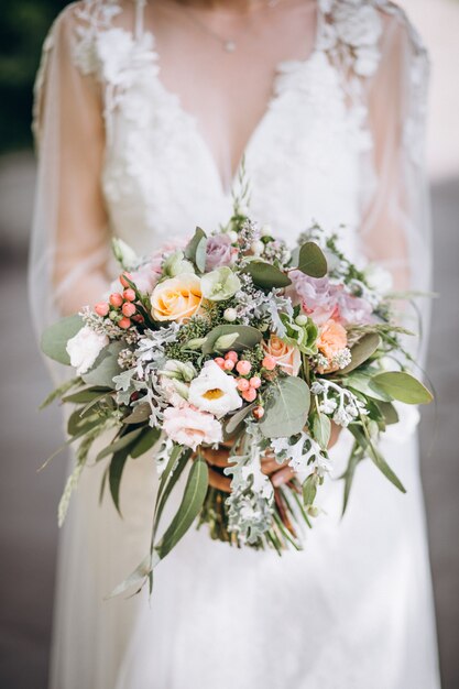 Bride holding her bouquet on her wedding day