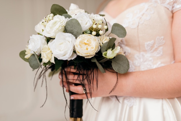 Bride holding wedding bouquet