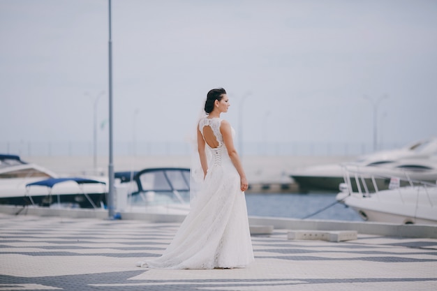 Bride looking the boats