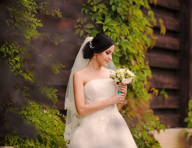 Bride looking her bouquet