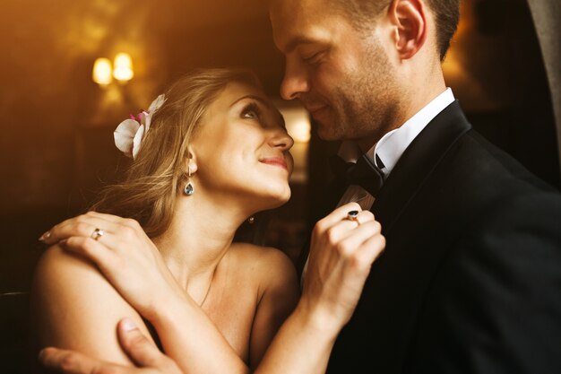 Bride in love looking at the groom