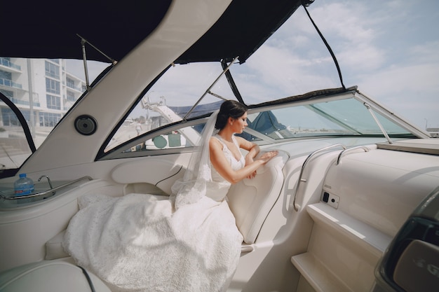 Bride lying on a boat