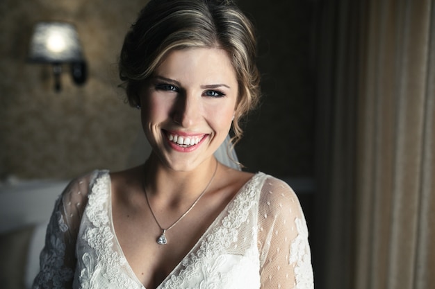 Bride posing in a hotel room