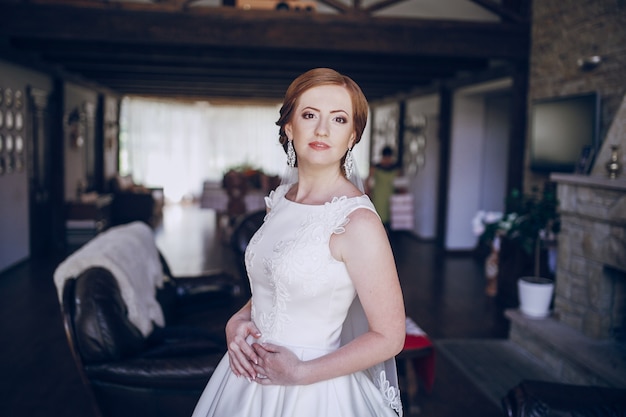 Bride possing in living room