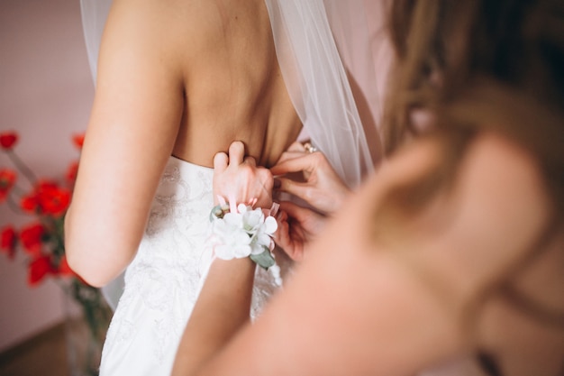 Bride preparing for wedding ceremony