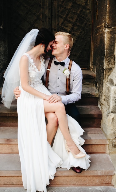 Free photo bride sitting on knees