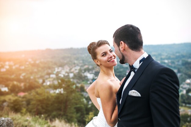 Bride smiling at her boyfriend