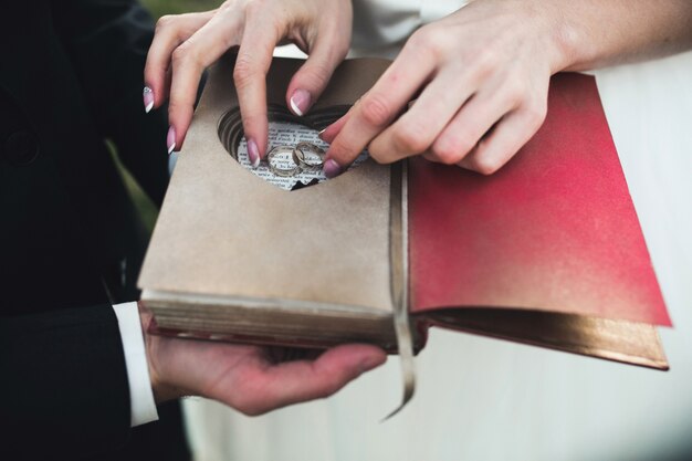 Bride taking the wedding rings