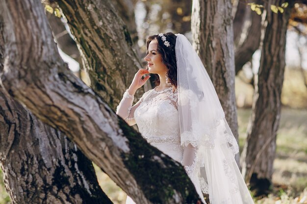 Bride among trees