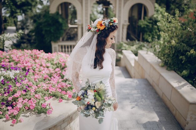 Bride walking with a diadem of flowers