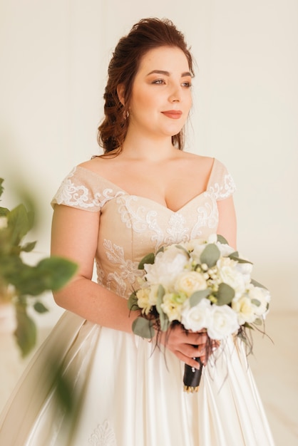 Bride with bouquet of flowers