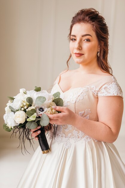 Bride with bouquet of flowers