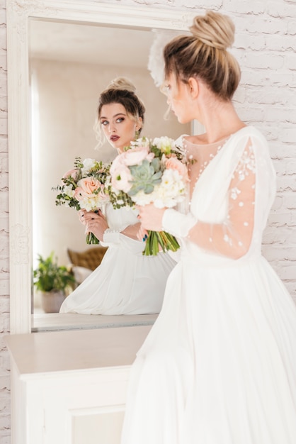 Bride with bouquet of flowers