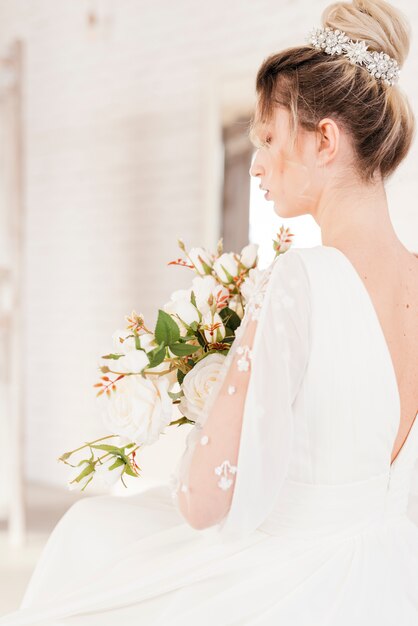 Bride with bouquet of flowers