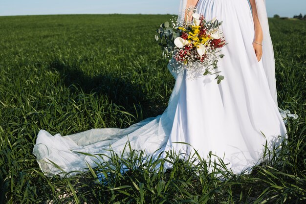 Bride with bouquet of flowers