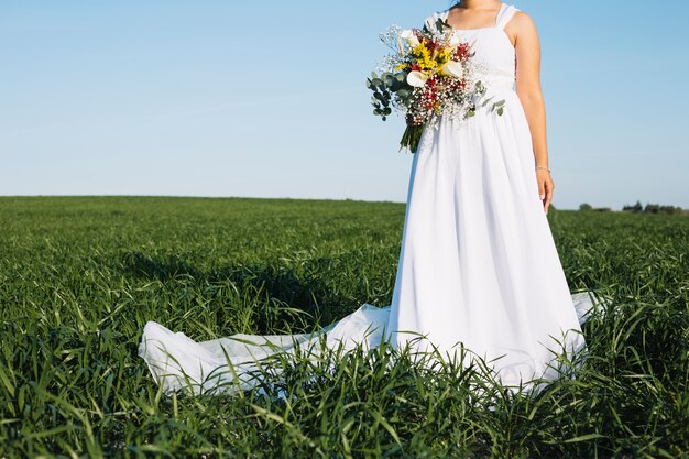 Bride with bouquet of flowers