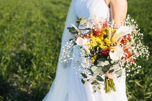 Bride with bouquet of flowers