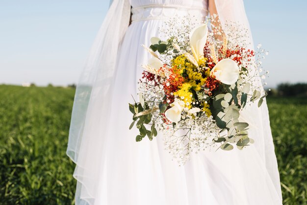 Bride with bouquet of flowers