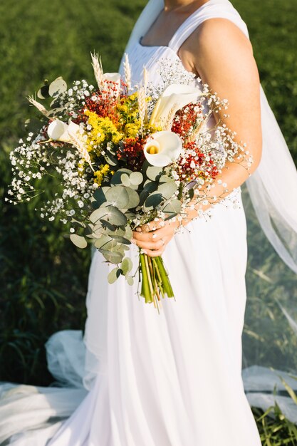 Bride with bouquet of flowers