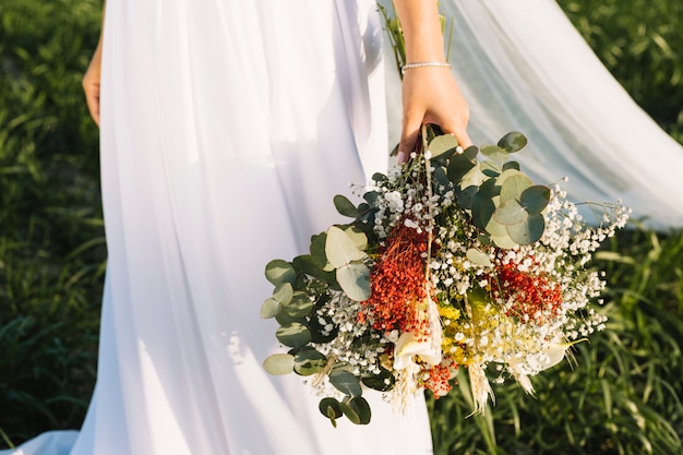 Bride with bouquet of flowers