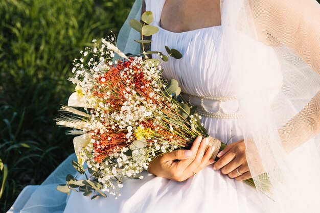 Bride with bouquet of flowers