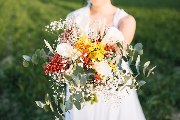 Bride with bouquet of flowers