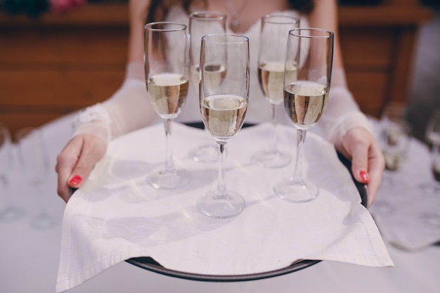 Bride with glass of champagne